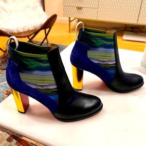 Christian Louboutin black, gold, and blue booties